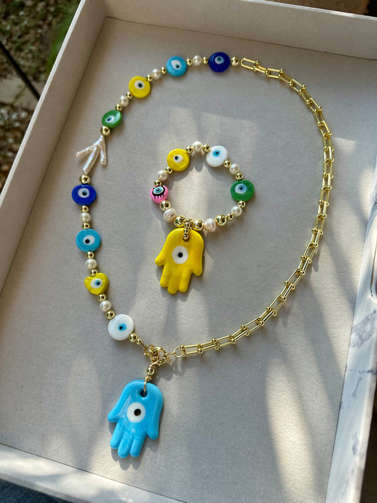 Blue Hamsa Necklace & Yellow Hamsa Bracelet (Sold Separately)