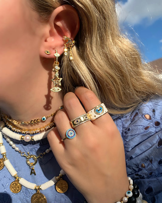 Gold Eye Rings (Each Sold Separately)